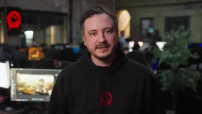 WARDOGS developer speaking to camera in a studio setting