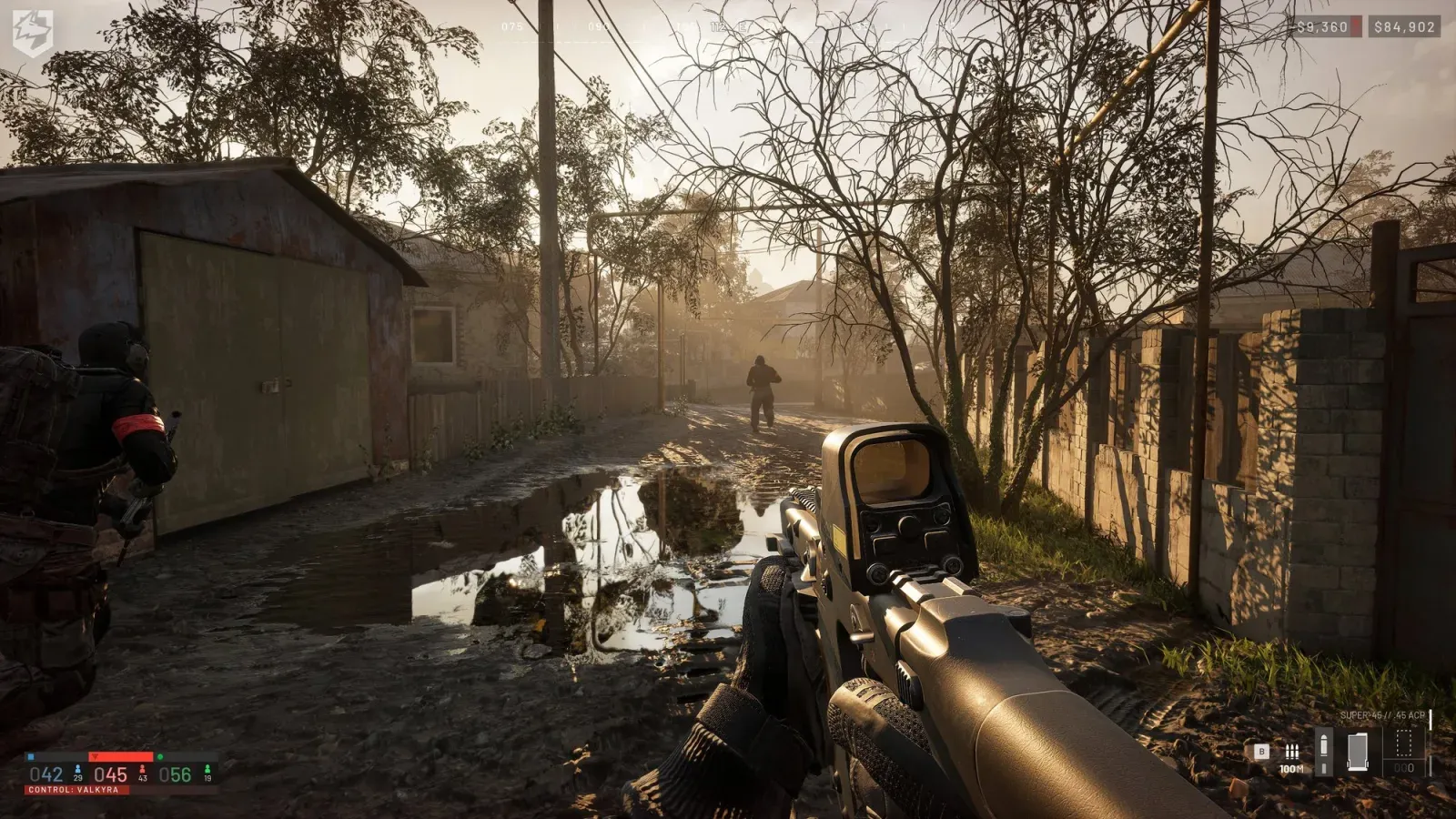 WARDOGS squad moving through a village with an optic-equipped weapon