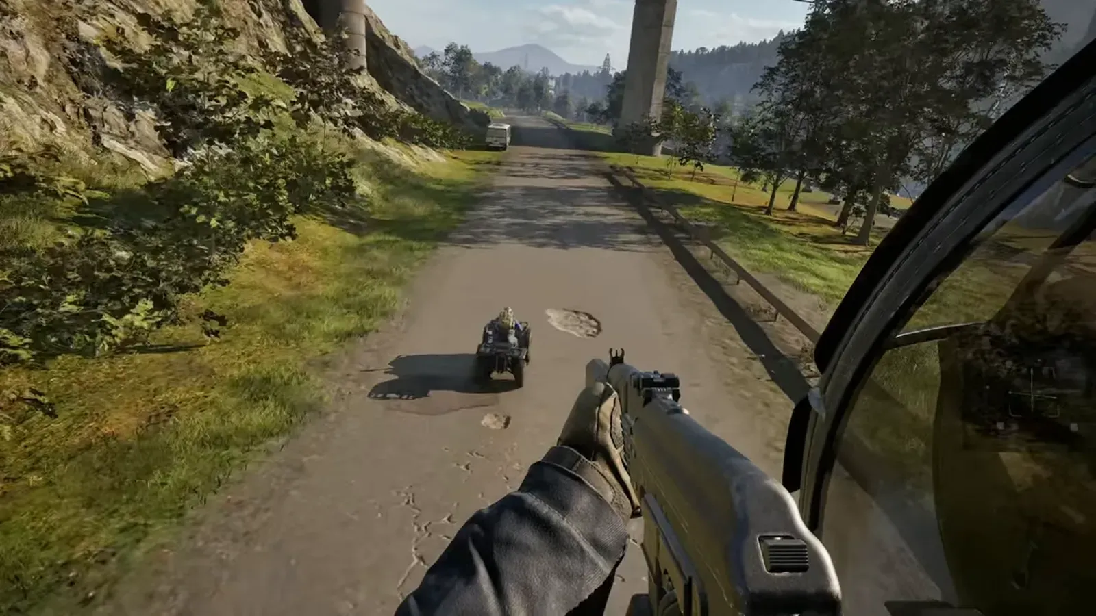 A WARDOGS vehicle driving along a dirt road
