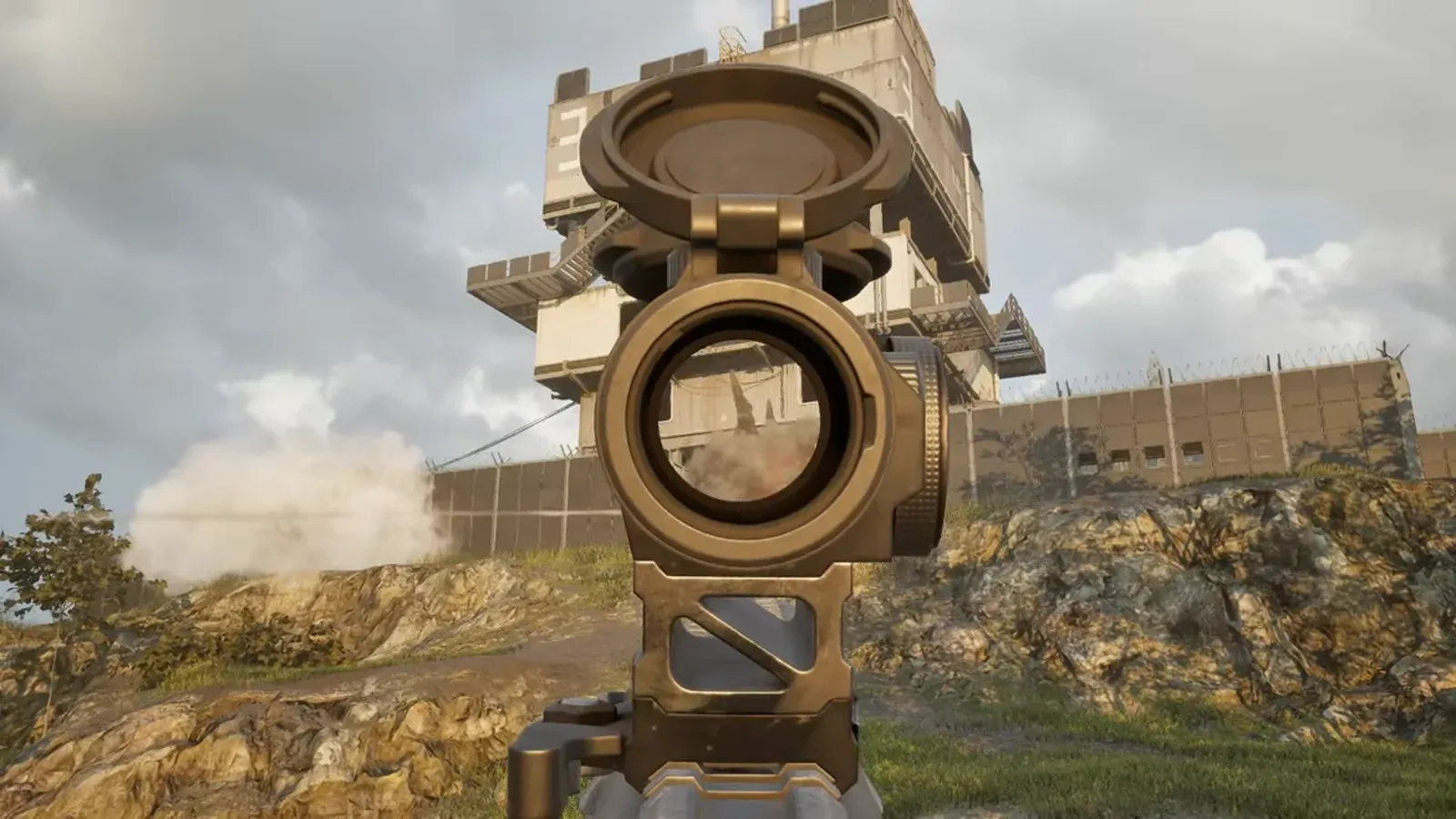 A WARDOGS player aiming through an optic over sandbag fortifications