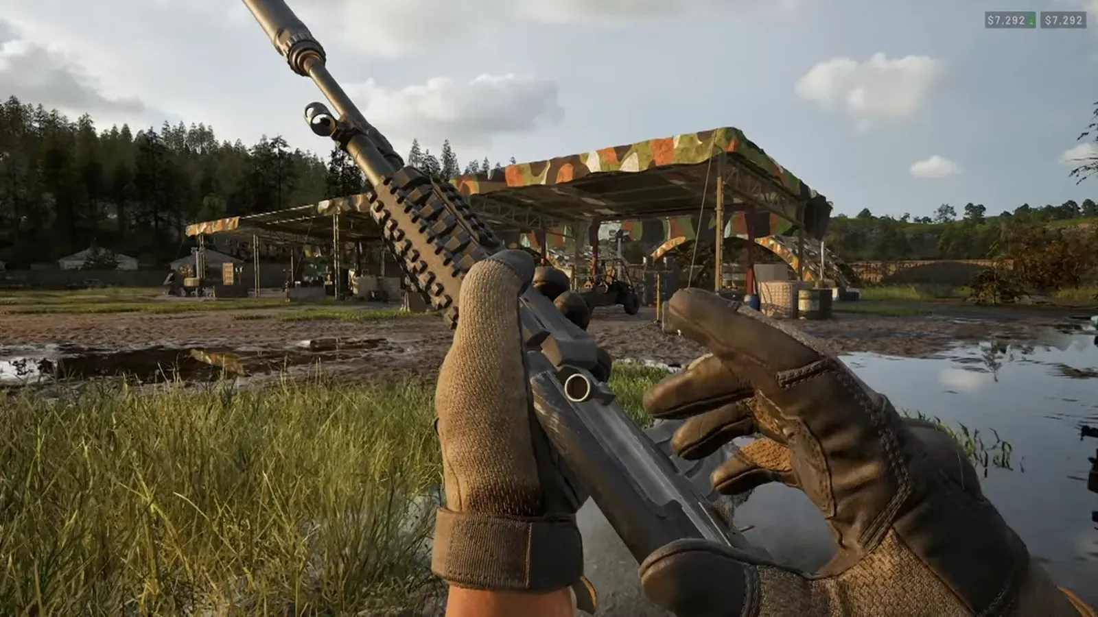 A WARDOGS player aiming a rifle in the rain