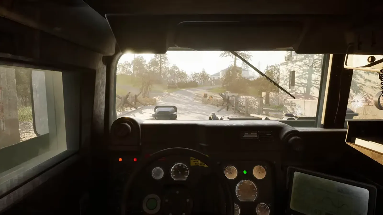 WARDOGS vehicle cockpit view with a road ahead